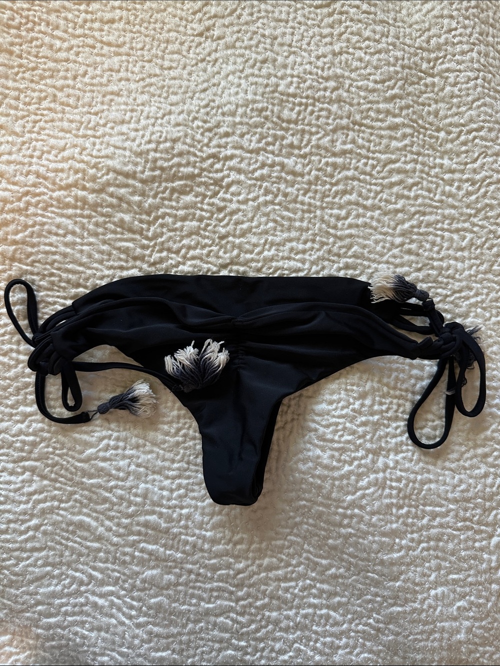 Micro Lowrise Black String Bikini Bottom with White-Tipped Tassels